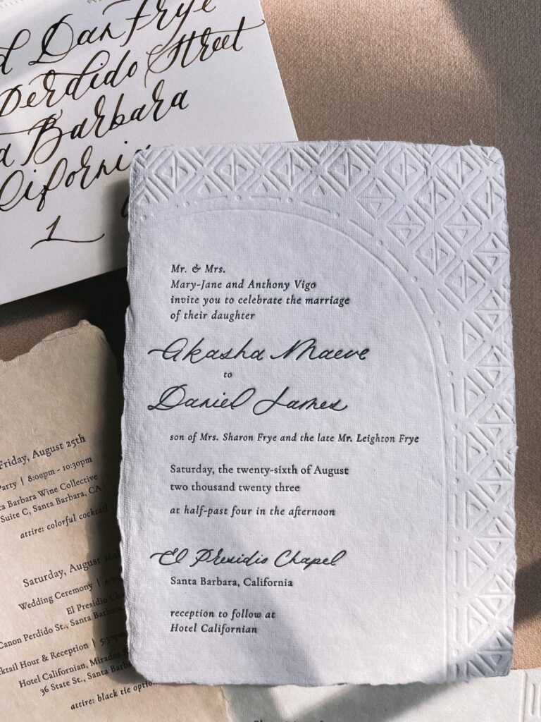 A closeup of a letterpress wedding invitation for a wedding in Santa Barbara, California
